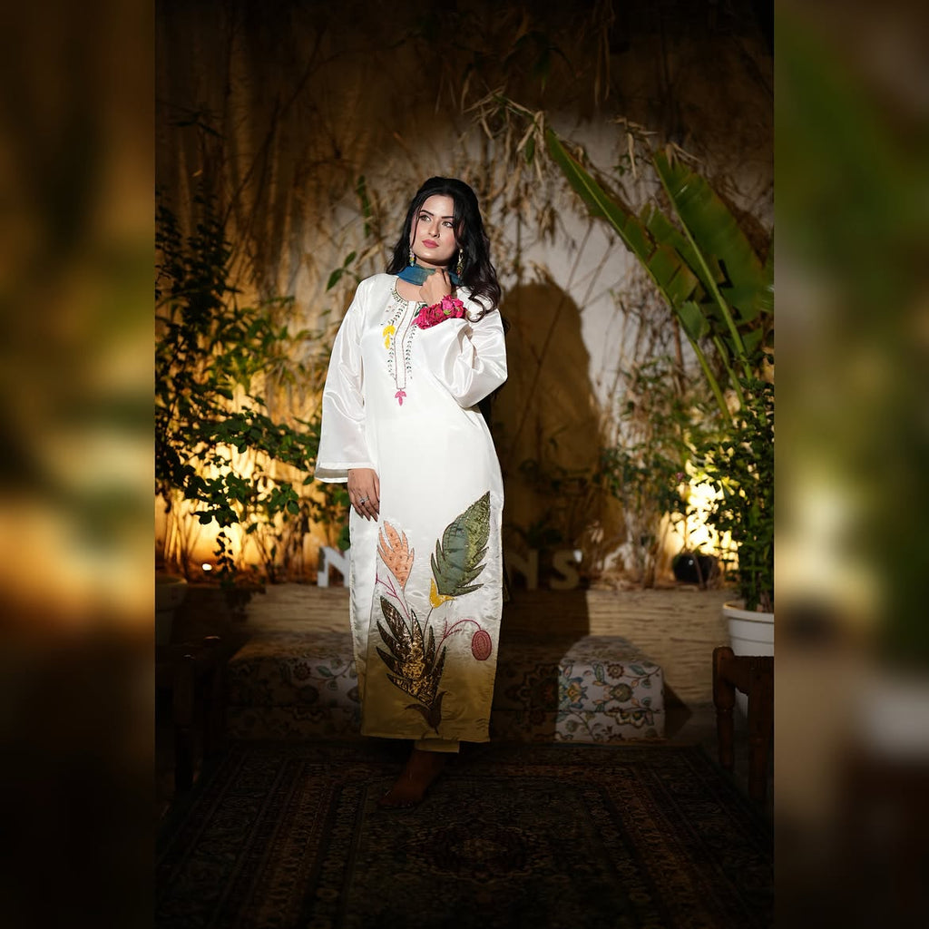 white kurta with delicate leaf and floral motifs