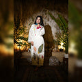white kurta with delicate leaf and floral motifs